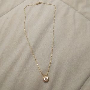 Gold necklace with white gem necklace